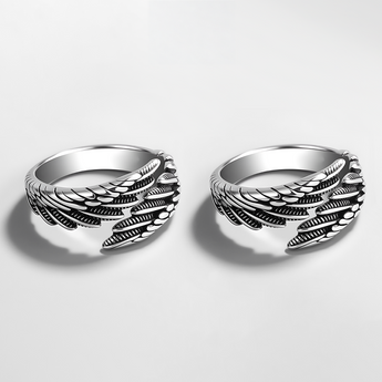 Par de anillos ajustables de alas de ángel en tono plateado