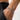 Pulsera plateada con placa ovalada grabada con FOREVER, en la muñeca de un hombre