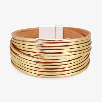 Pulsera multicapa de hilos delgados en tono dorado con barras metálicas sobre fondo claro