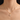 Woman wearing the gold-tone four-leaf clover pendant necklace