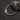 Pulsera de cadena cubana grabada personalizada sobre una roca en una superficie oscura