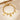 Gold paperclip chain bracelet with letter E charm, round coin charms and bead charms