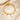 Gold paperclip chain bracelet with letter L charm, round coin charms and bead charms
