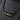Close-up of black cylinder beads and a bronze-tone patterned bead on black cords
